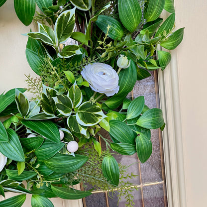 Handcrafted lush greenery front door wreath with white roses. Elegant farmhouse decor perfect for spring, summer, and year-round display.