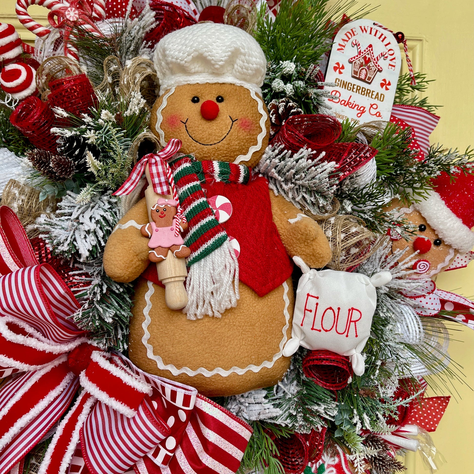 Decorative Christmas wreath with gingerbread man and candy cane theme