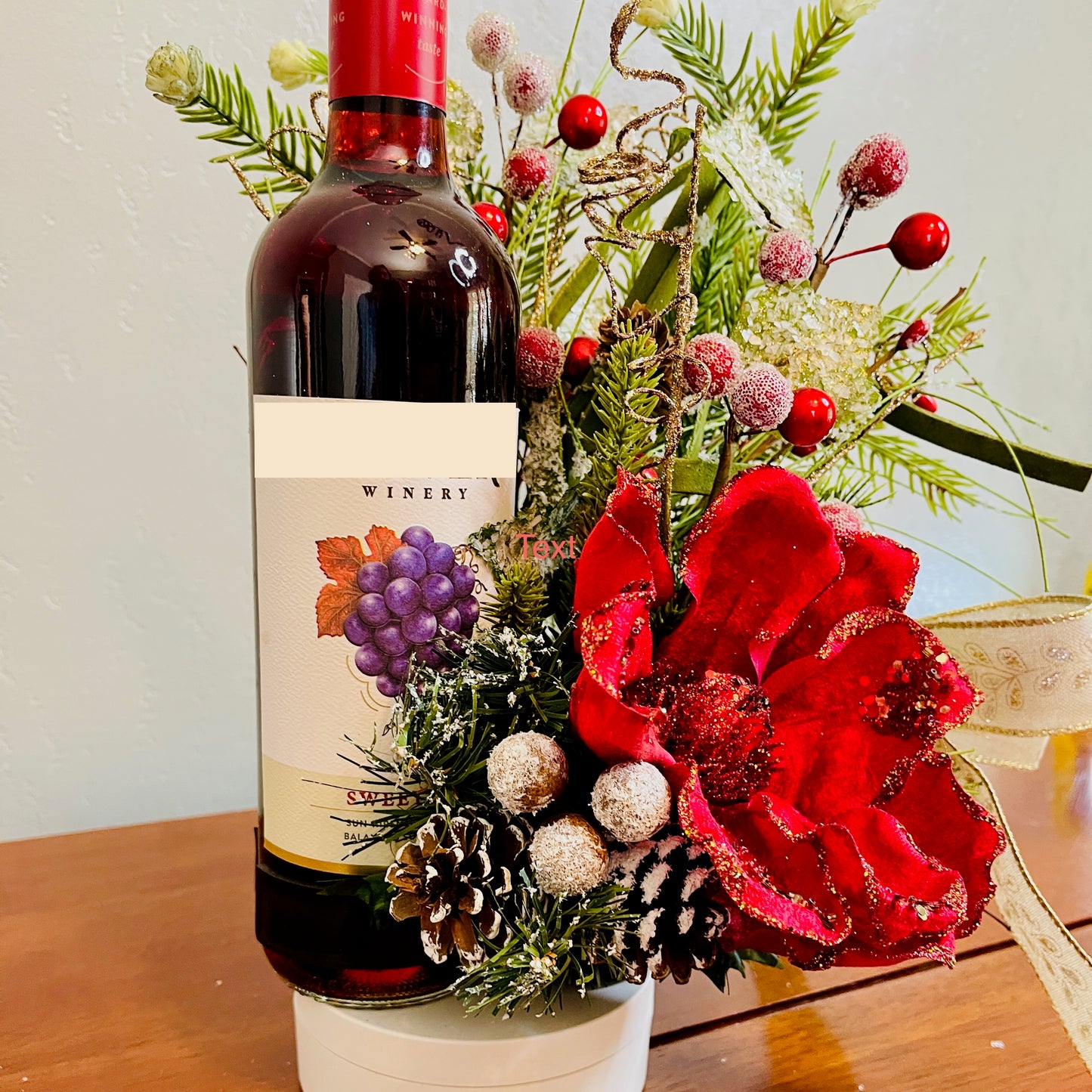 Holiday Wine Bottle Centerpiece – Christmas Floral Gift for Teacher or Coworker | Elegant Red Velvet Flower Arrangement for Home or Office