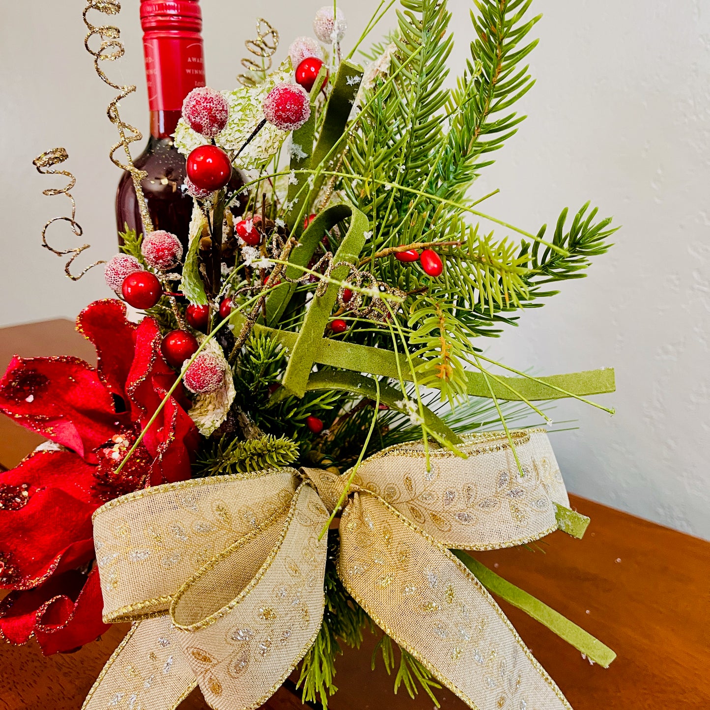 Holiday Wine Bottle Centerpiece – Christmas Floral Gift for Teacher or Coworker | Elegant Red Velvet Flower Arrangement for Home or Office
