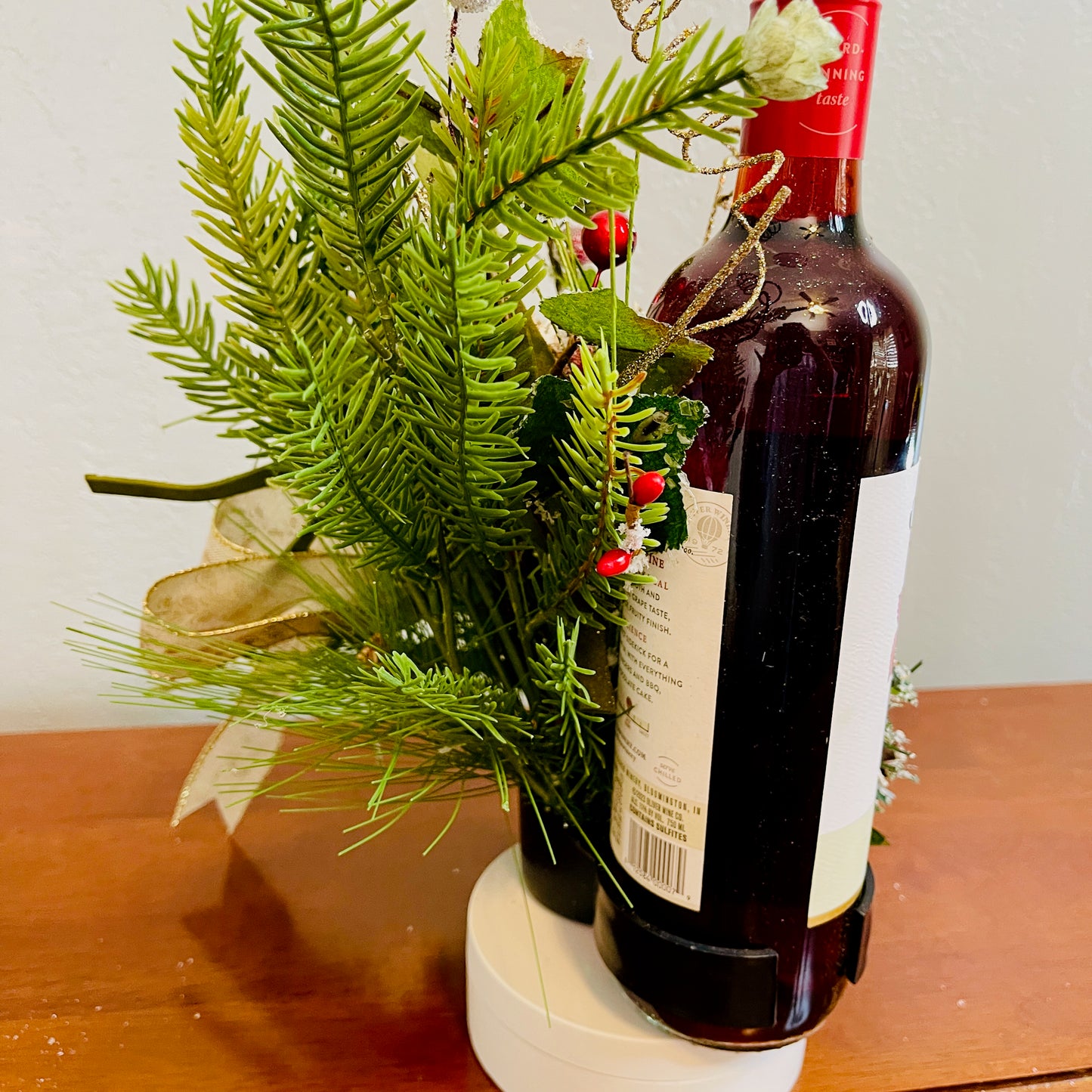Holiday Wine Bottle Centerpiece – Christmas Floral Gift for Teacher or Coworker | Elegant Red Velvet Flower Arrangement for Home or Office